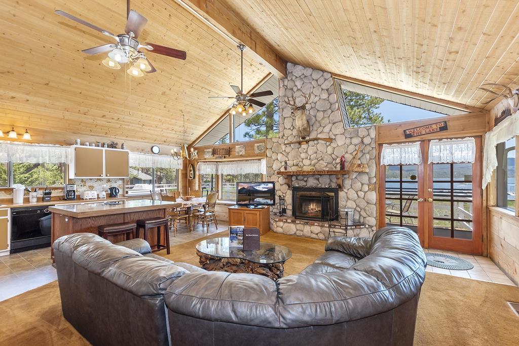 Beautiful Living Room with Stone Fireplace