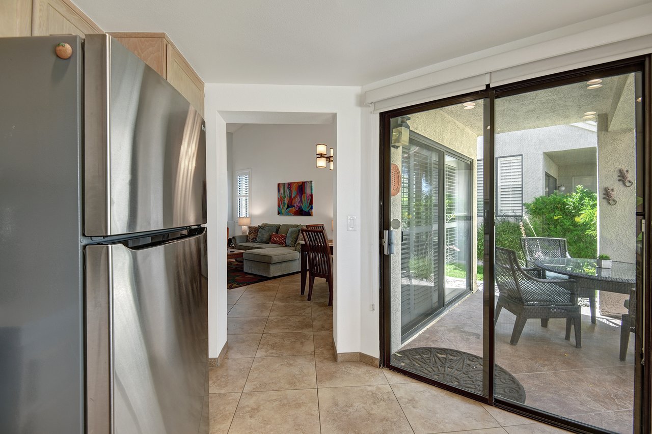KITCHEN OPENING TO PATIO