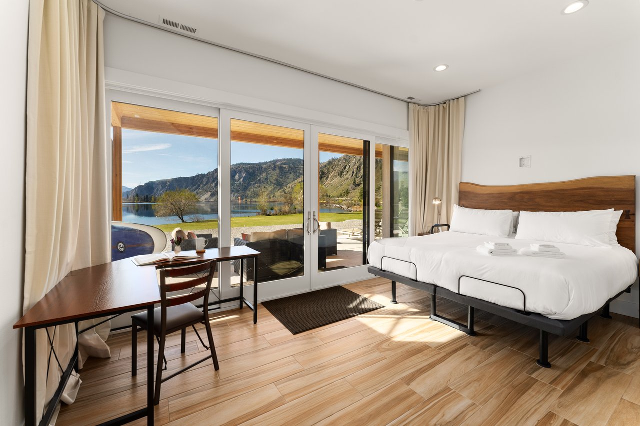 King Bed and Large sliding glass doors to covered patio