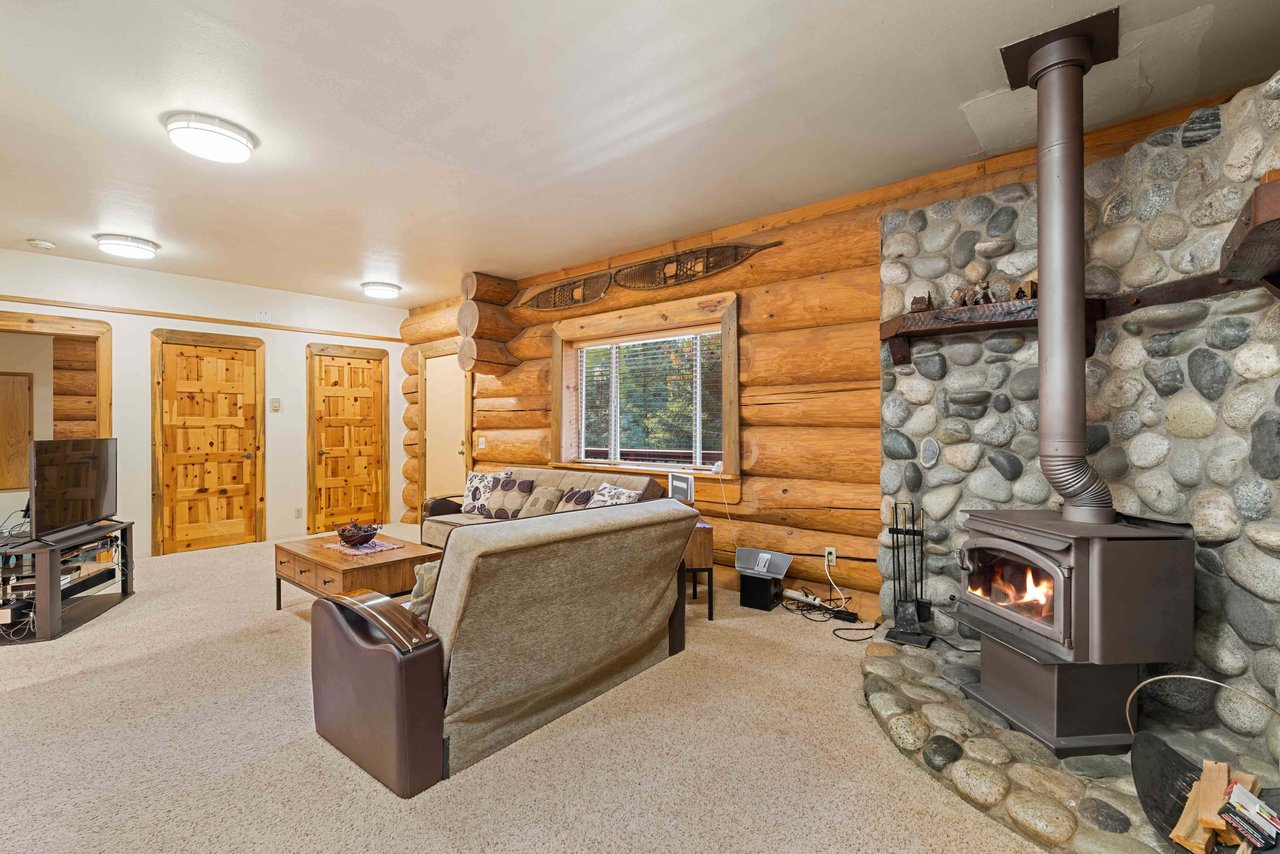 Living Room has Wood Burning Stove in Living Room