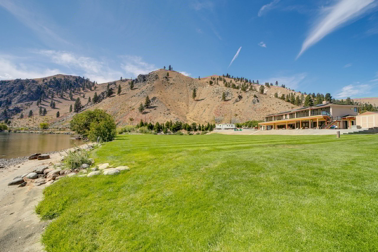 Large Landscaped Yard with Low Bank Waterfront