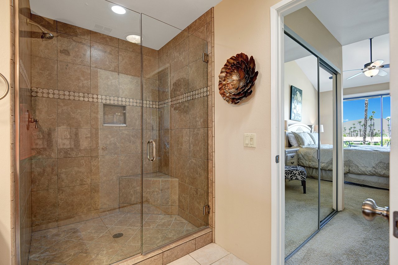 PRIMARY BEDROOM BATHROOM REVERSE.jpg mls