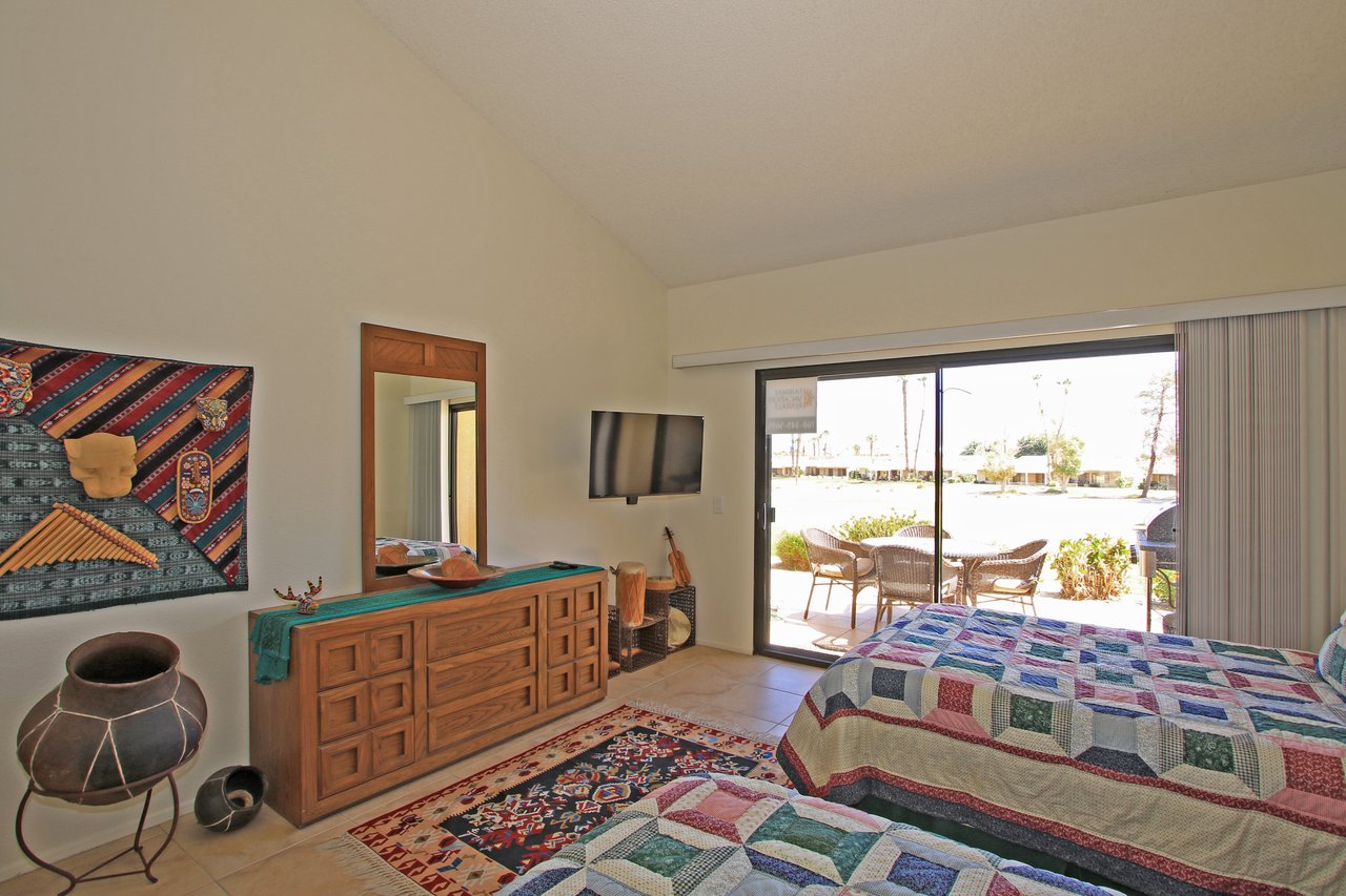 Two Double Beds with Dresser