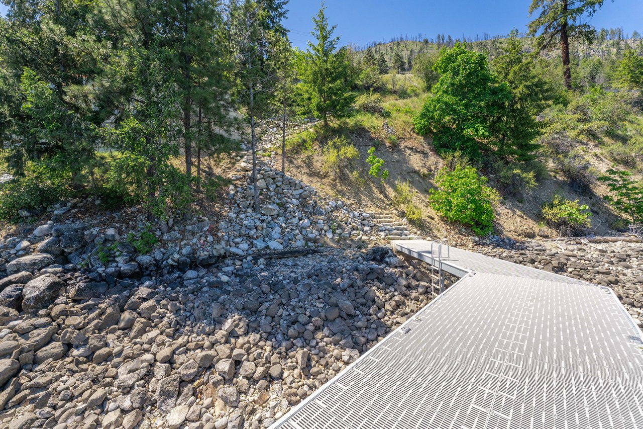 Steps / trail down to the private dock.