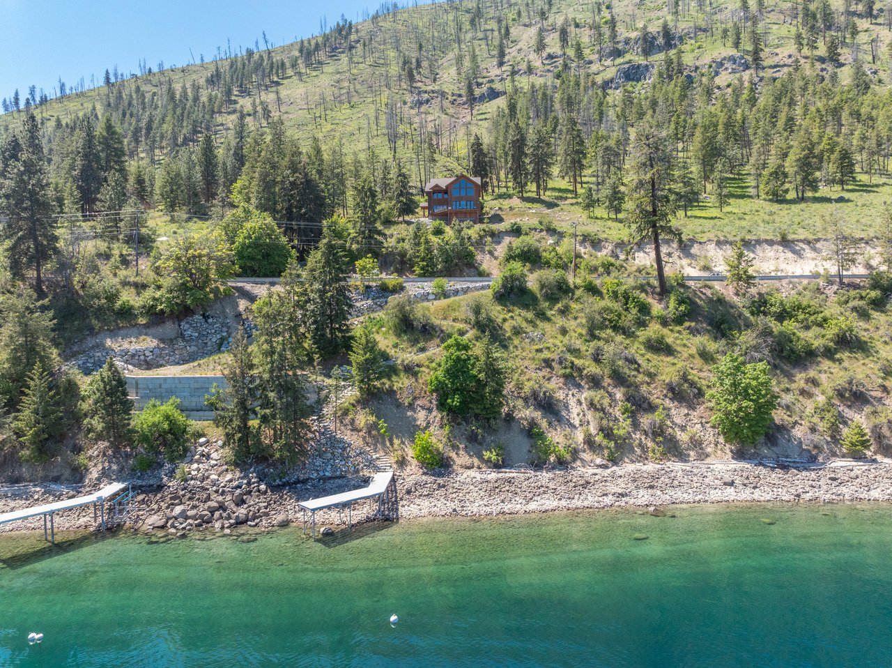 Full view of house, trail and private dock.