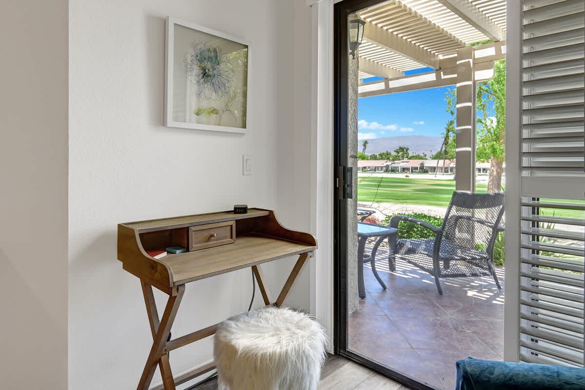 MAIN BEDROOM SITTING DESK OUT TO VIEW
