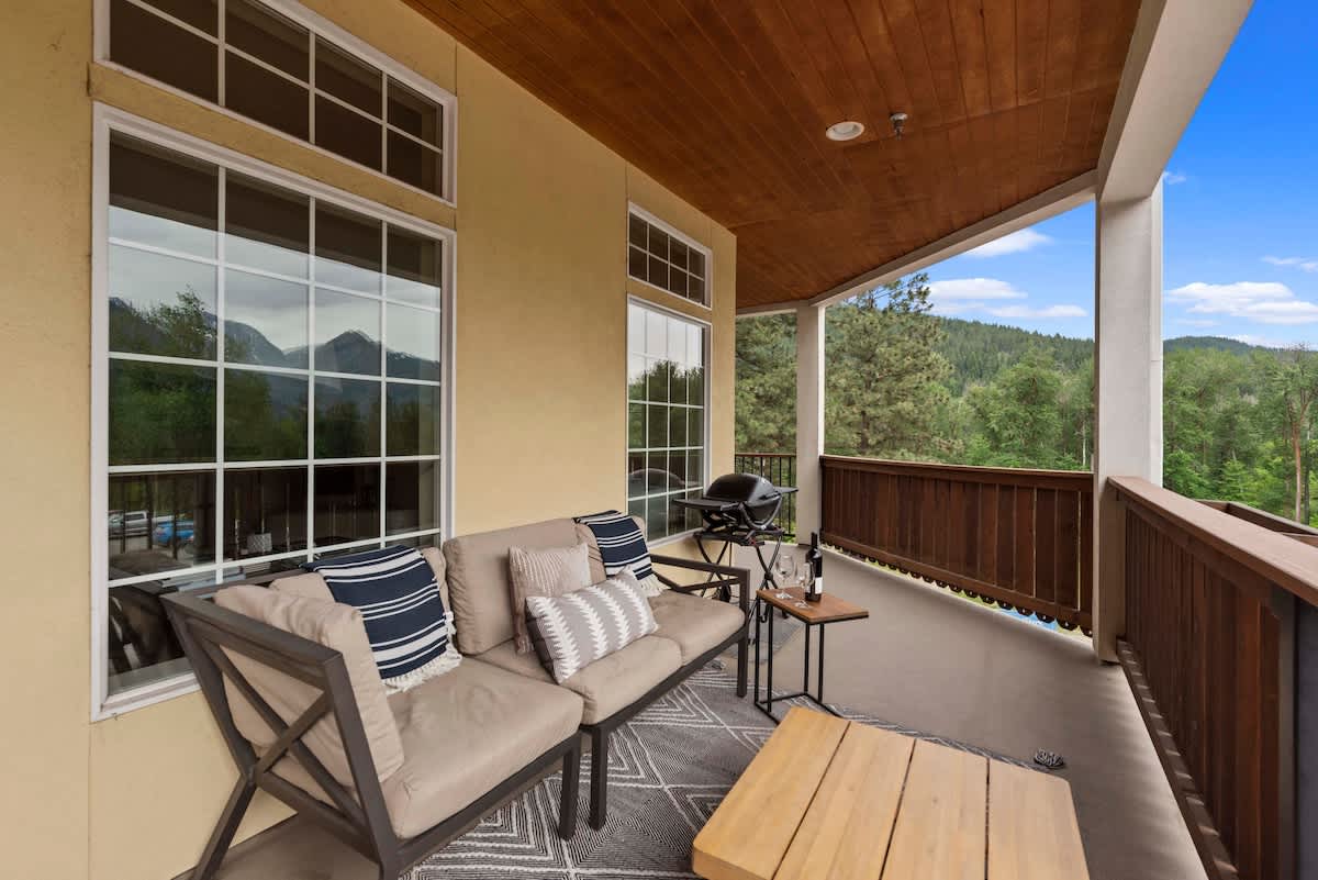 Large Covered, Wrap-Around Deck with seating