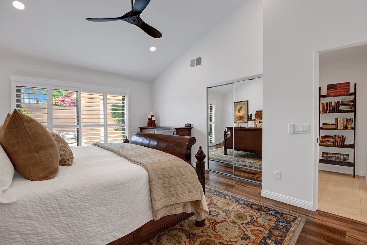 PRIMARY BEDROOM OVER BED.jpg mls