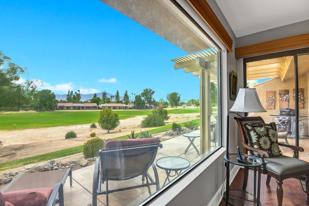 MAIN BEDROOM VIEW OF GOLF COURSE